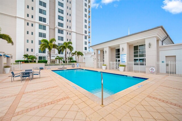 view of swimming pool with a patio area