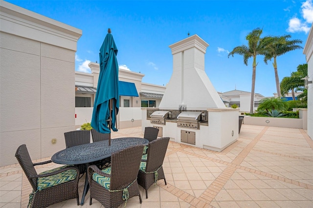 view of patio / terrace featuring area for grilling and an outdoor kitchen