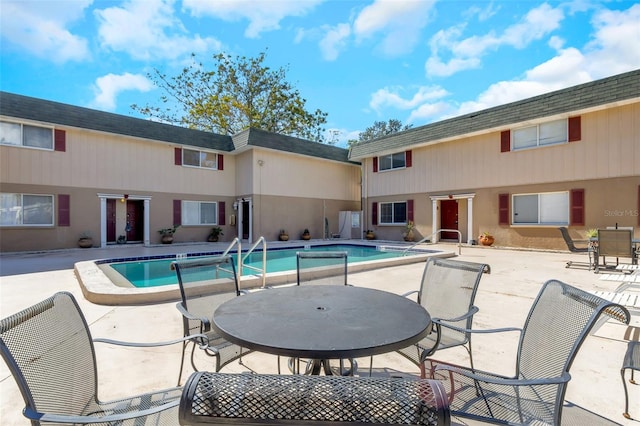 view of pool with a patio area