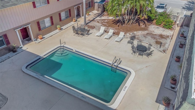 view of pool featuring a patio