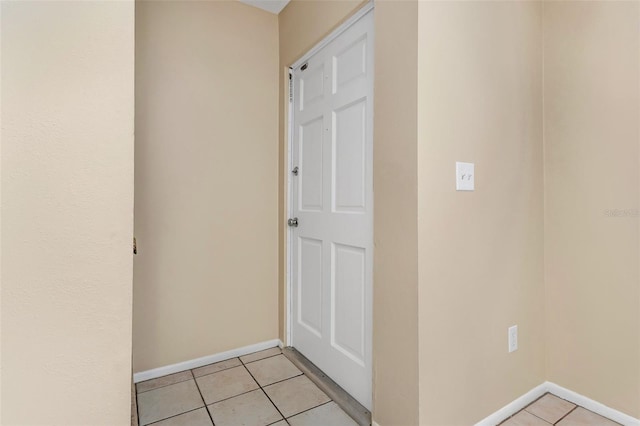 interior space featuring light tile patterned floors