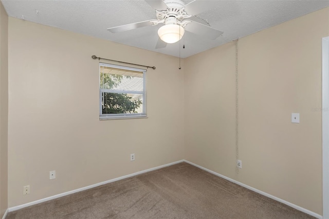 unfurnished room with a textured ceiling, ceiling fan, and carpet flooring