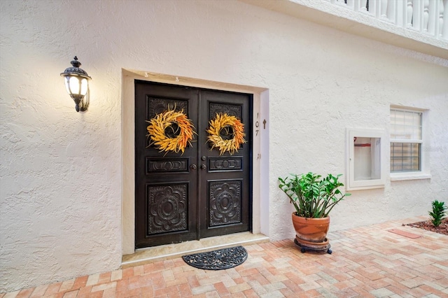 property entrance featuring french doors