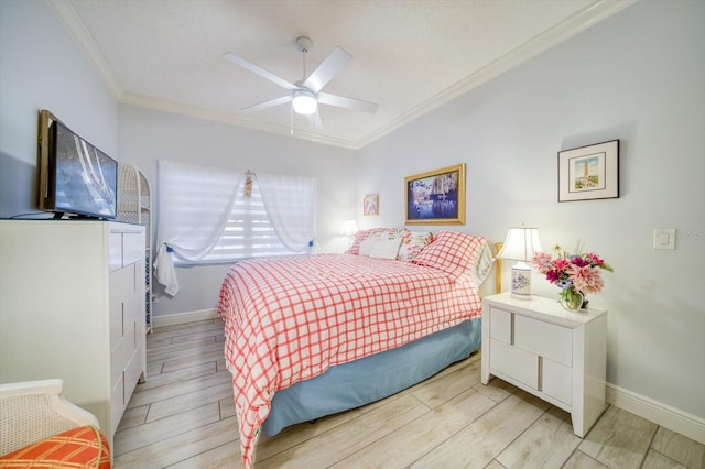 bedroom with crown molding, ceiling fan, light wood-type flooring, and vaulted ceiling