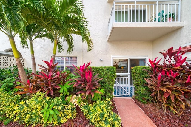 property entrance with a balcony