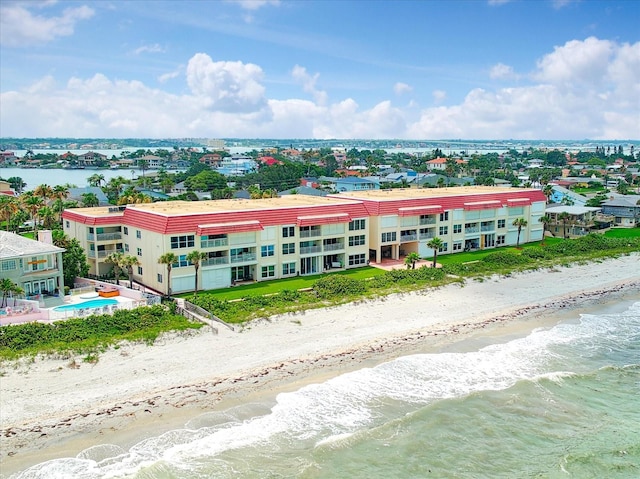 aerial view with a beach view and a water view