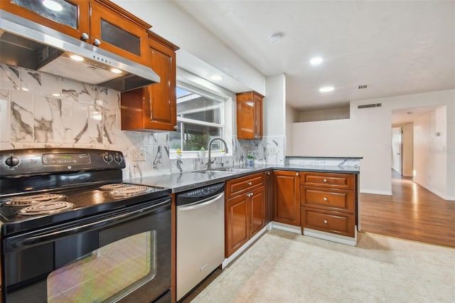 kitchen featuring dishwasher, sink, decorative backsplash, black range with electric cooktop, and extractor fan