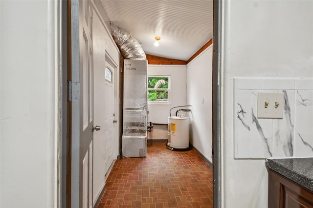 clothes washing area with electric water heater