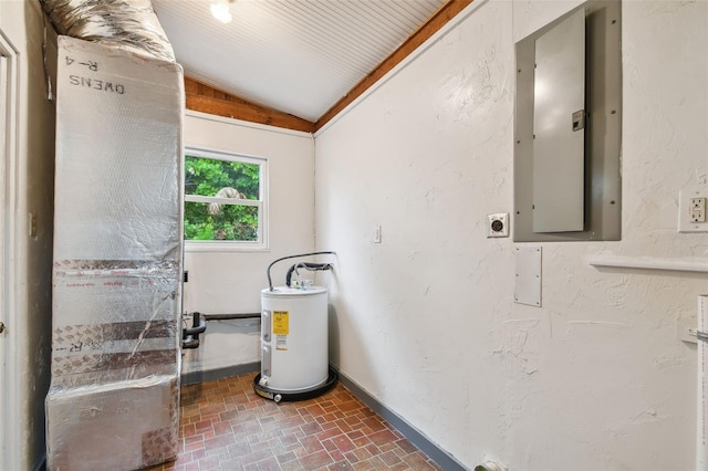 utility room featuring electric panel and water heater