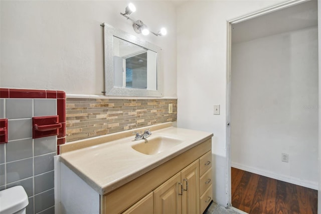 bathroom with vanity and wood-type flooring