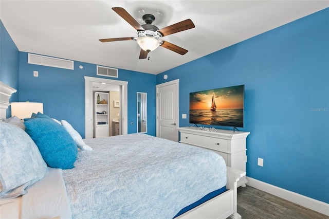 bedroom featuring ceiling fan and dark wood-type flooring