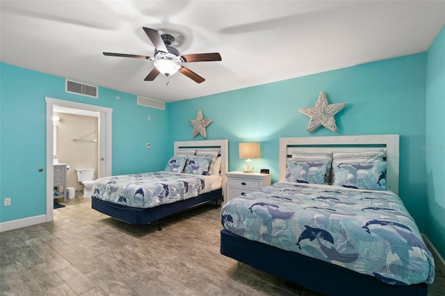 bedroom with hardwood / wood-style flooring, ensuite bath, and ceiling fan