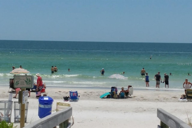 view of water feature with a beach view