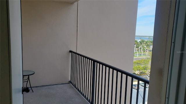 balcony featuring a water view