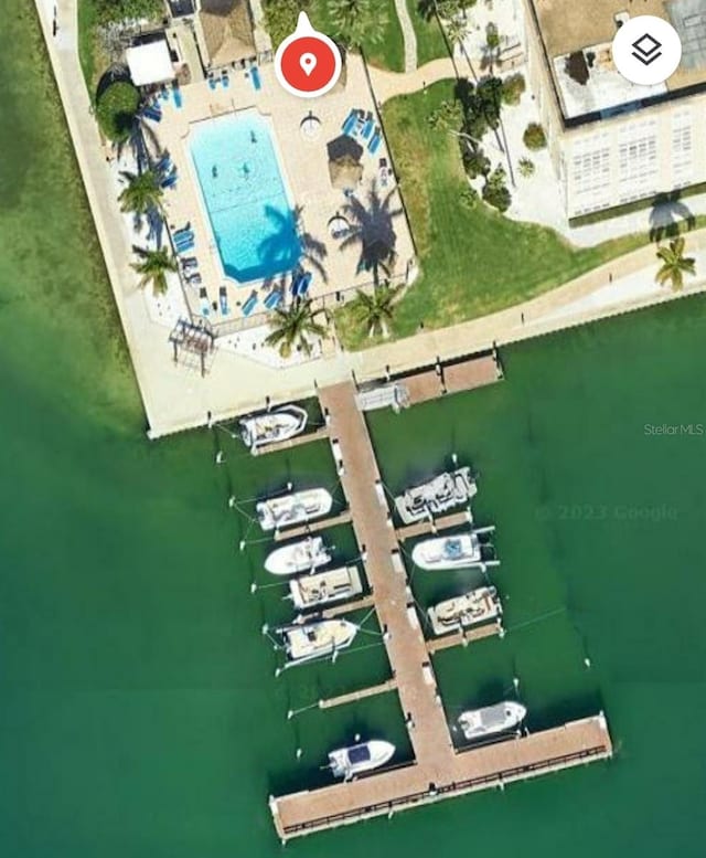 birds eye view of property featuring a water view