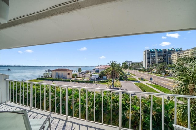 balcony featuring a water view