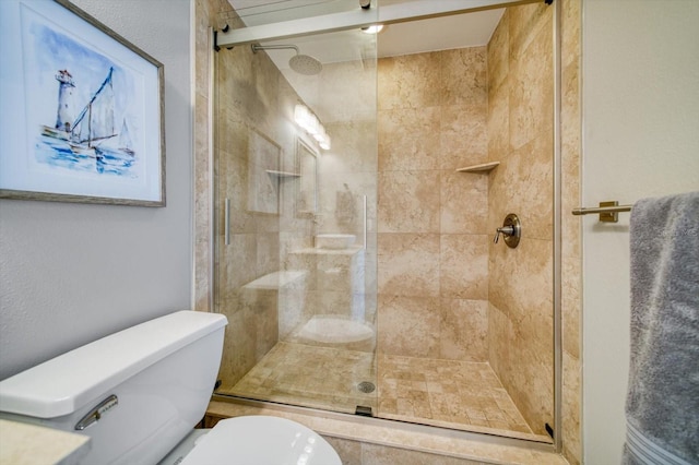 bathroom with toilet and walk in shower