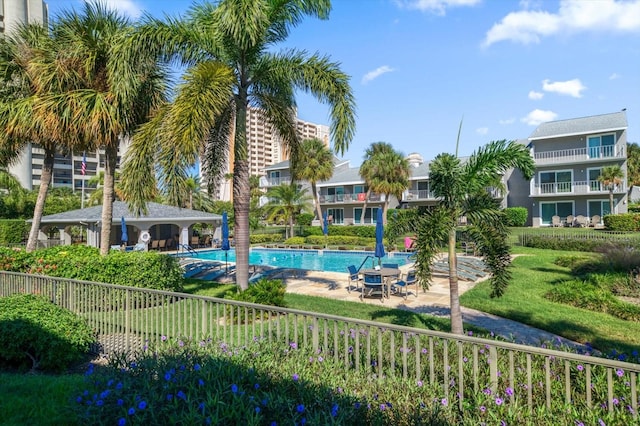 view of swimming pool featuring a patio area