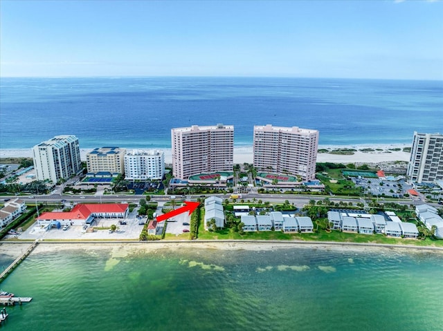 aerial view featuring a view of the beach and a water view