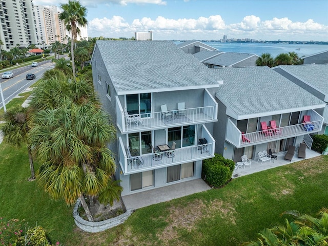 drone / aerial view featuring a water view