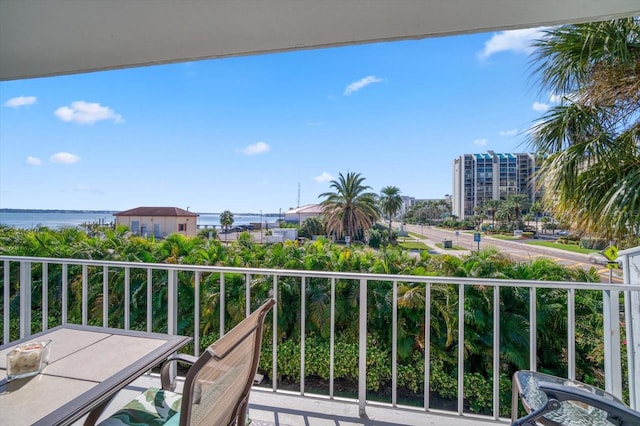 balcony featuring a water view