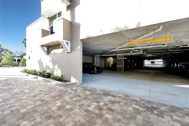 exterior space featuring a carport