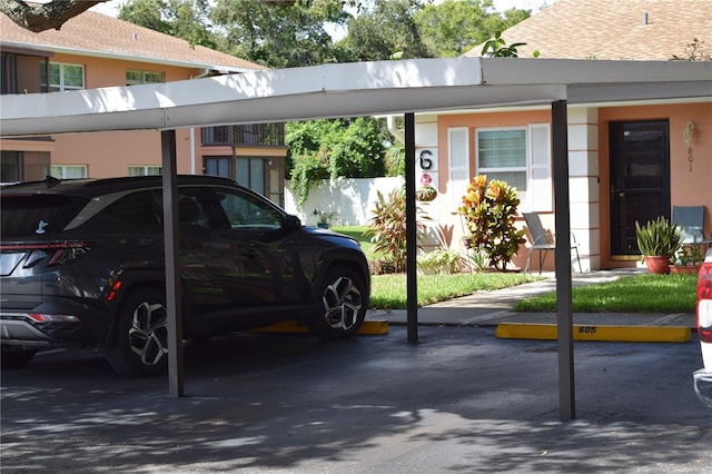 view of car parking with a carport