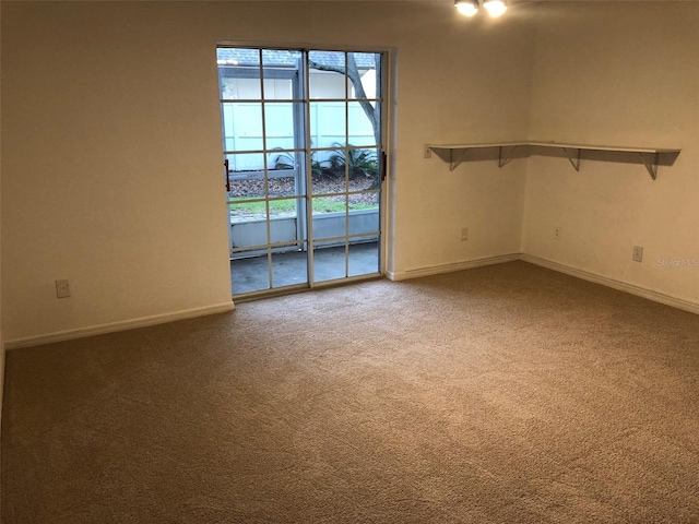 empty room with carpet flooring