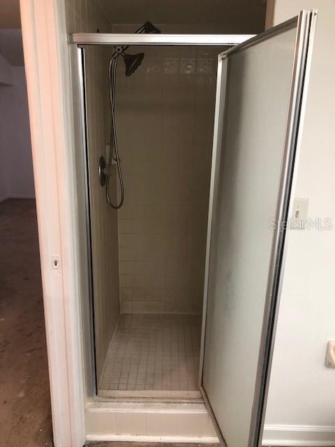 bathroom featuring walk in shower