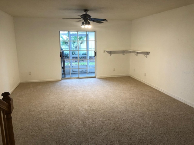 unfurnished room with carpet floors and ceiling fan