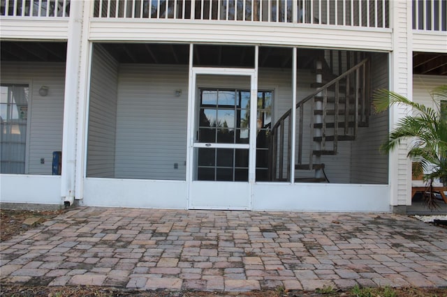 doorway to property featuring a balcony