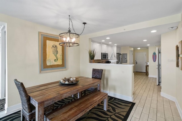 dining space with light wood-type flooring