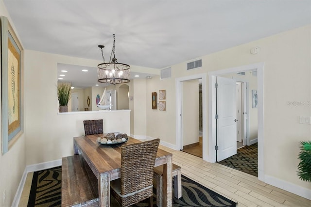 dining area with light hardwood / wood-style flooring