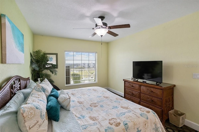 bedroom featuring ceiling fan