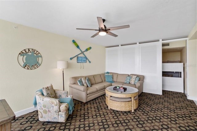 living room with ceiling fan