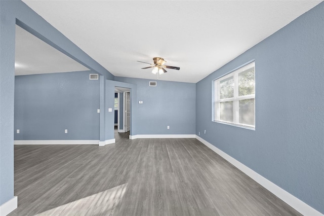 unfurnished room featuring ceiling fan and wood-type flooring