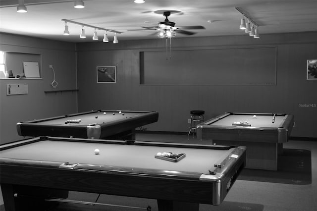 game room with ceiling fan, wooden walls, rail lighting, and billiards