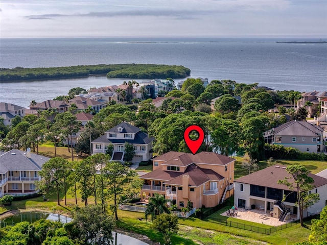 aerial view with a residential view and a water view