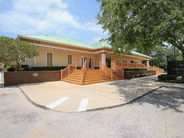 view of front facade with metal roof