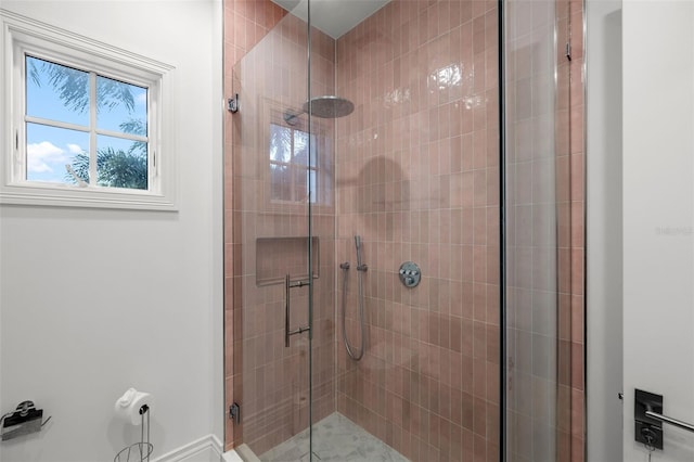 full bathroom with a shower stall