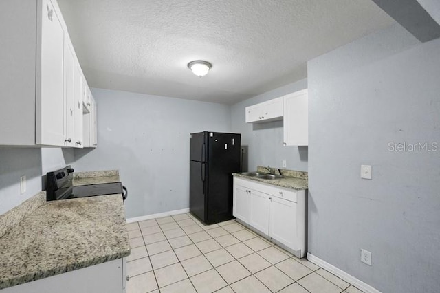 kitchen with a textured ceiling, white cabinetry, sink, and black appliances