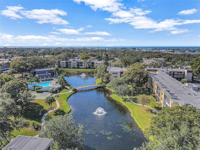 drone / aerial view with a water view