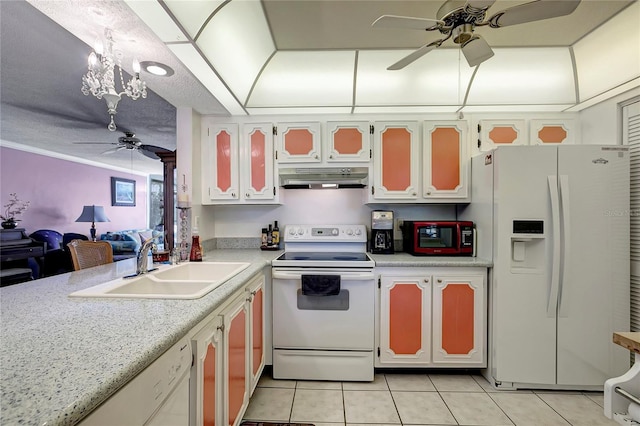 kitchen featuring white appliances, sink, light tile patterned flooring, white cabinetry, and a chandelier