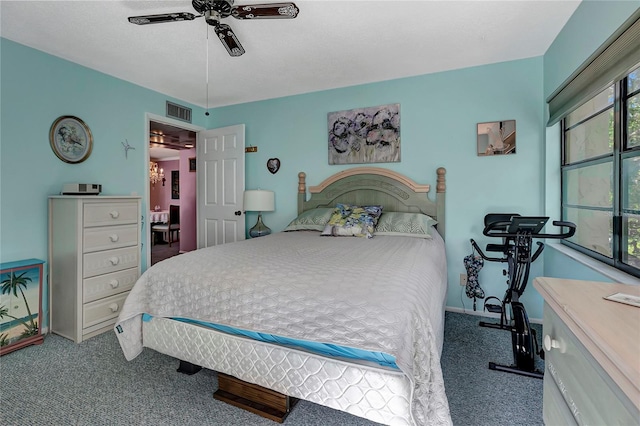 carpeted bedroom with ceiling fan