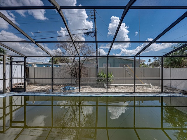 view of pool with a lanai