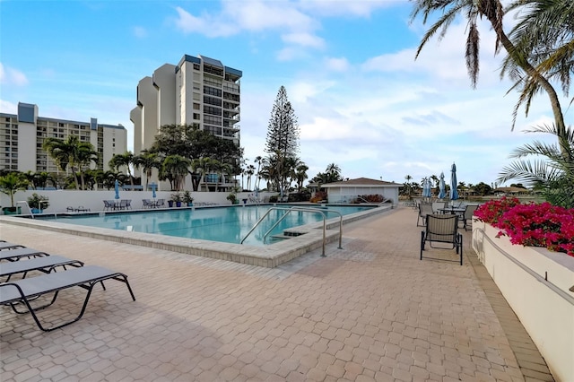 pool featuring a patio area