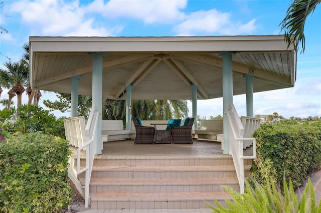 wooden deck featuring a gazebo