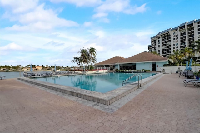 community pool with a patio