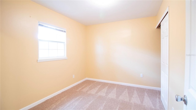 unfurnished room with carpet