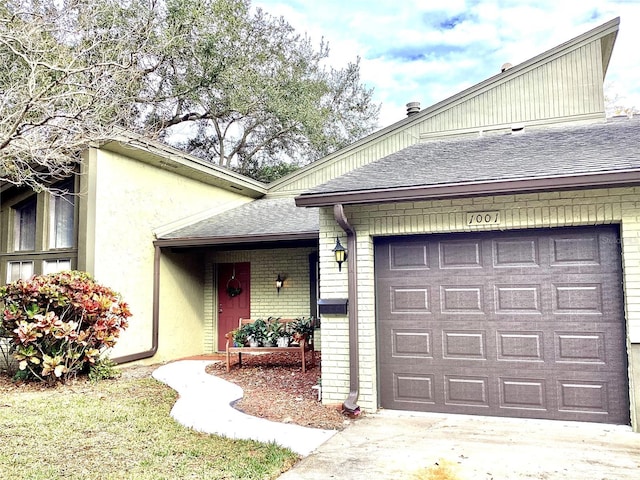 view of front of property featuring a garage